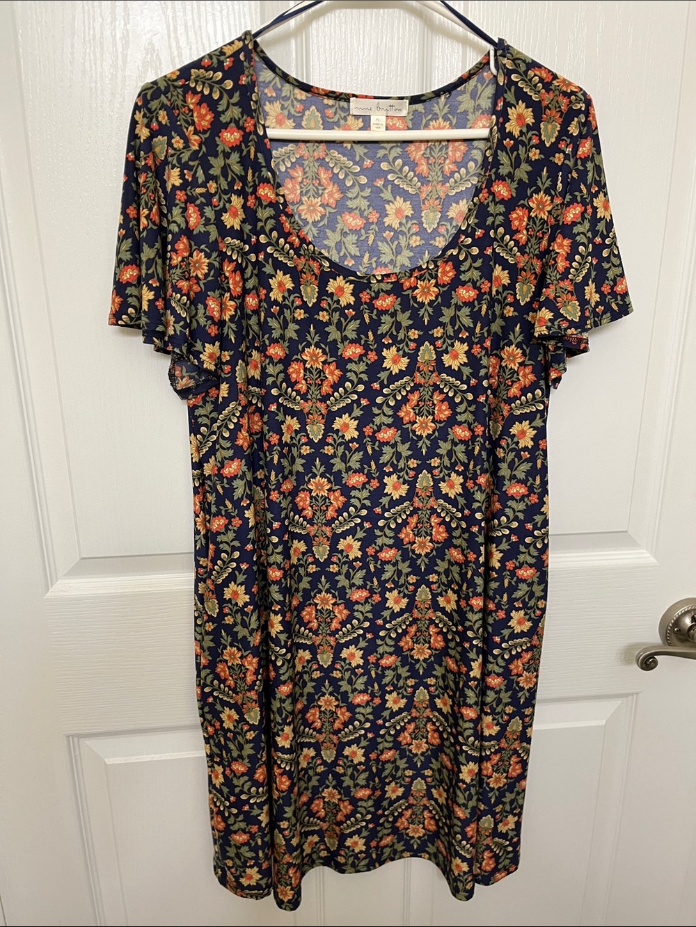nine britton Navy Floral Scoop-Neck Dress with Orange & Green Motif. Mid length.